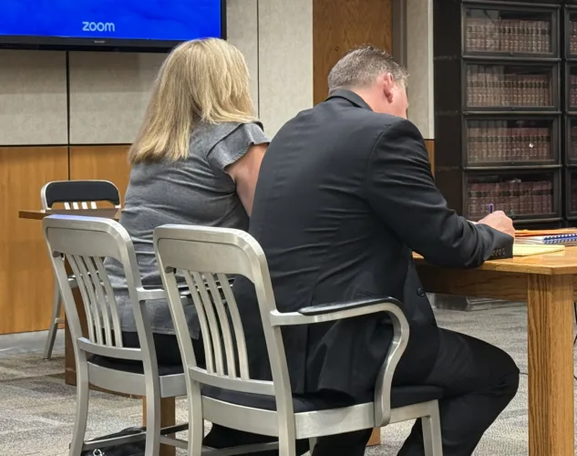 Former teacher’s aide considers plea in child abuse case